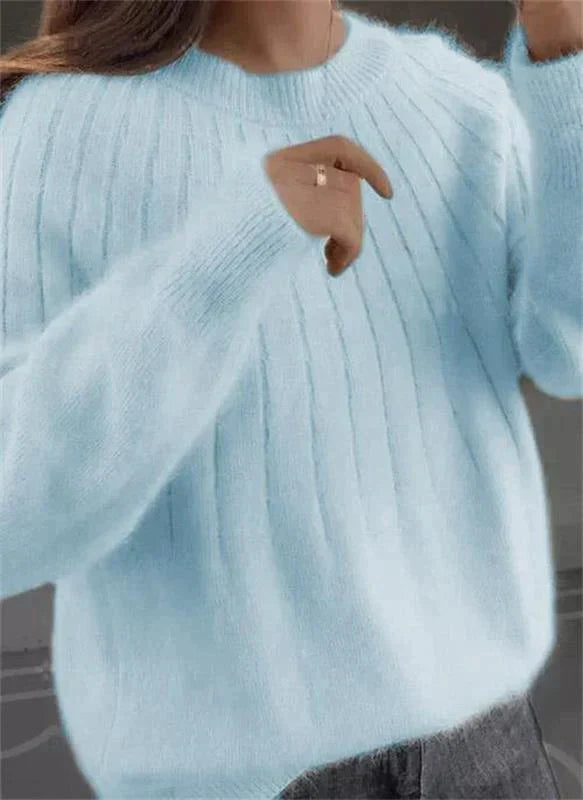 Pink lightweight cashmere jumper with a soft, breathable feel for autumn