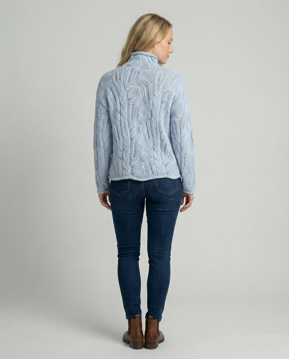 Women's chunky cable knit pointelle roll neck jumper