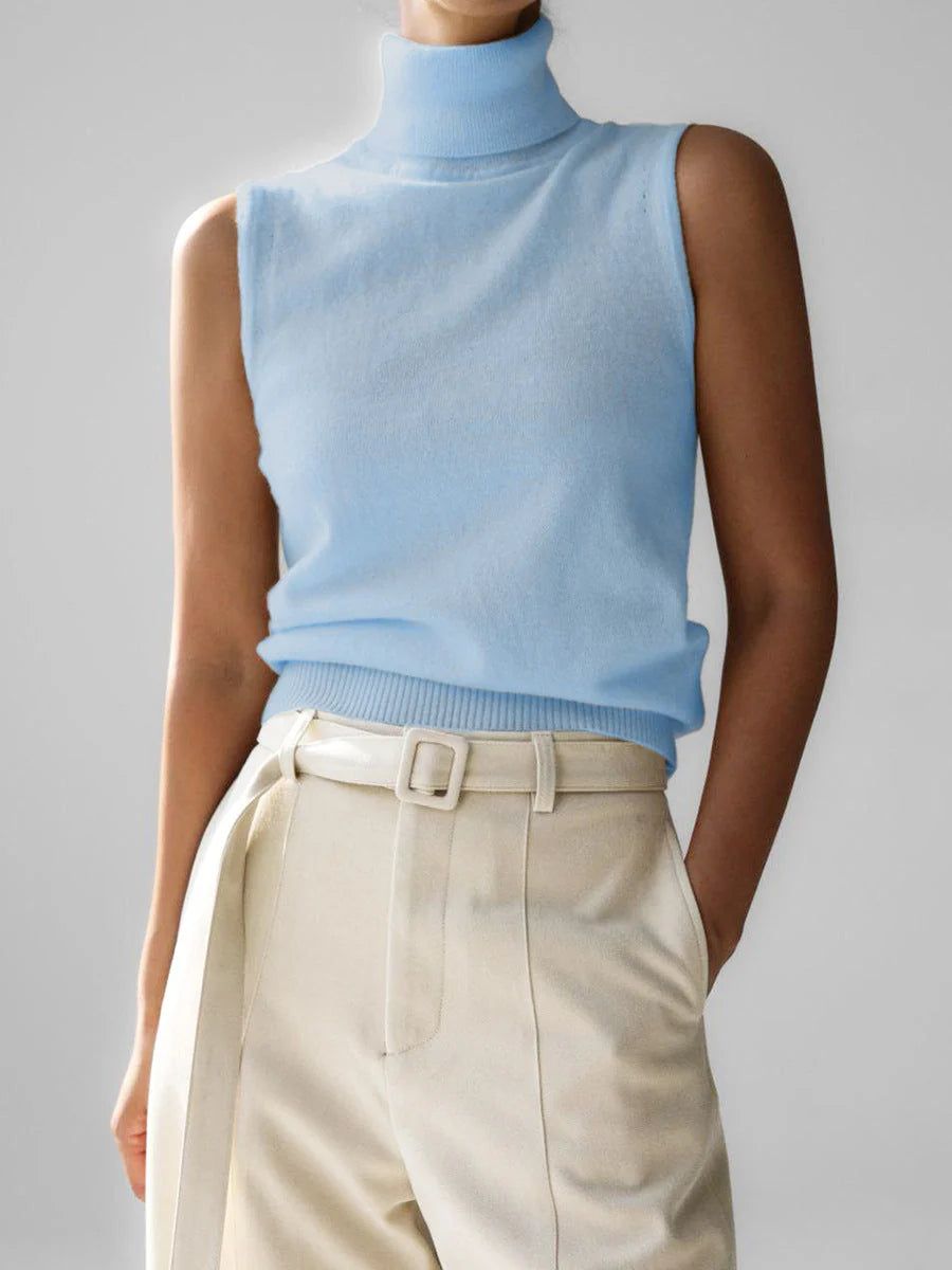 Women's light blue fine knit sleeveless roll neck jumper