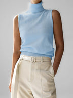 Women's light blue fine knit sleeveless roll neck jumper