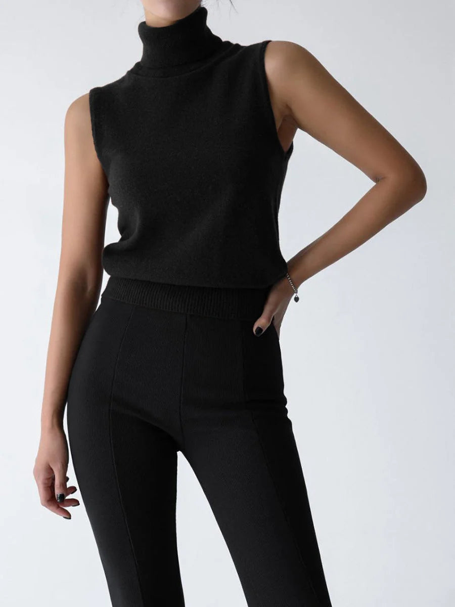 Women's black fine knit sleeveless roll neck jumper