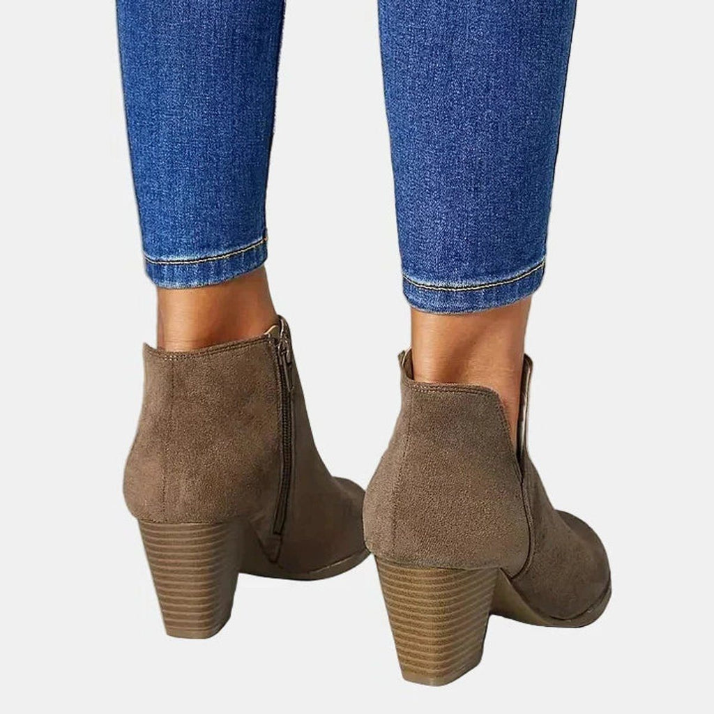 Suede ankle boots with block heel and side zip, product still life