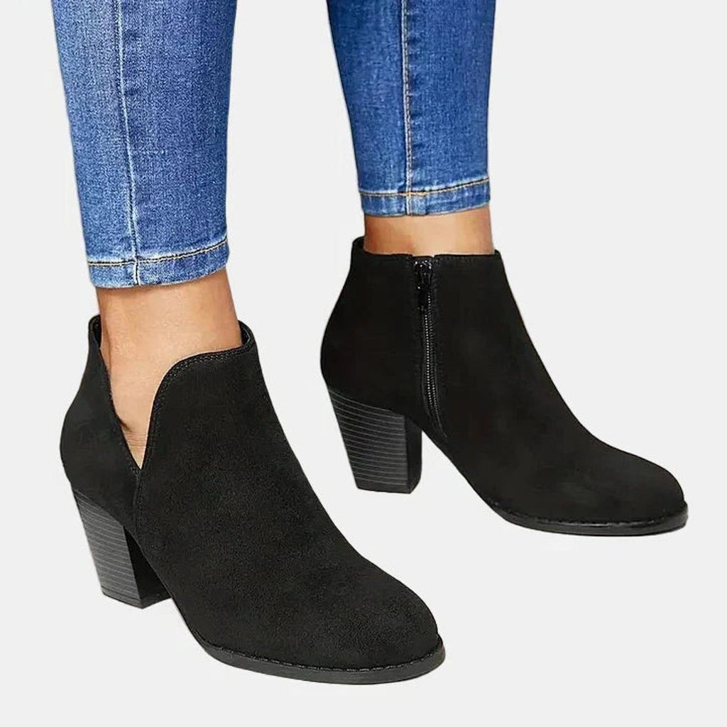 Suede ankle boots with block heel and side zip, product still life
