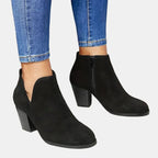 Suede ankle boots with block heel and side zip, product still life