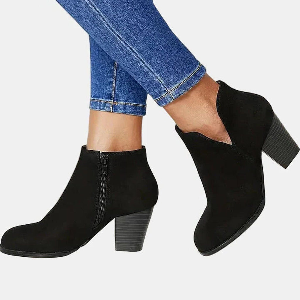 Suede ankle boots with block heel and side zip, product still life