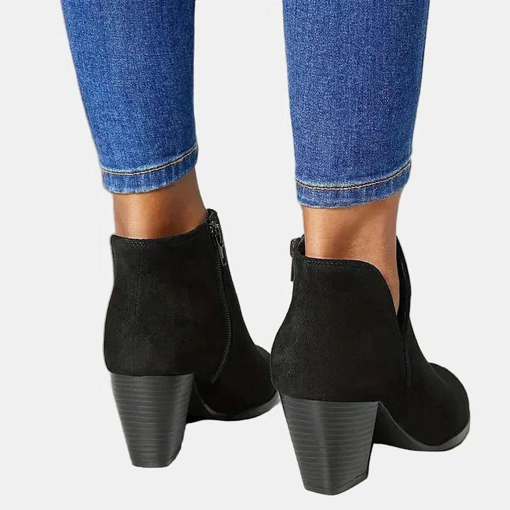 Suede ankle boots with block heel and side zip, product still life
