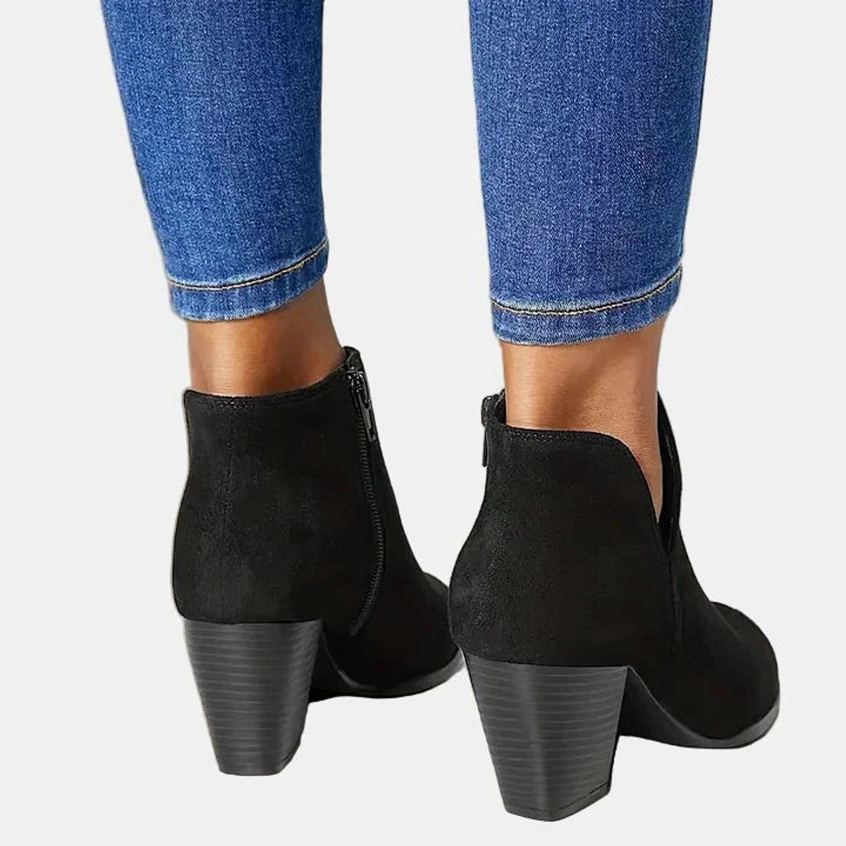 Suede ankle boots with block heel and side zip, product still life