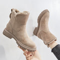 Suede platform ankle boots, slip-on style, product still life