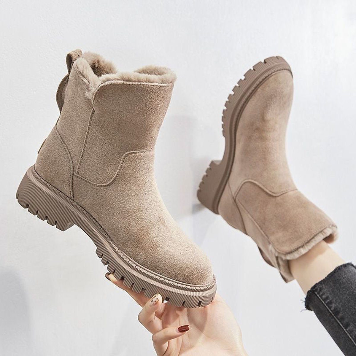 Suede platform ankle boots, slip-on style, product still life