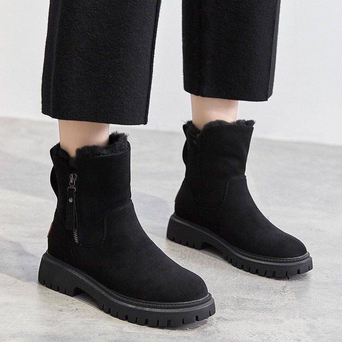 Suede platform ankle boots, slip-on style, product still life