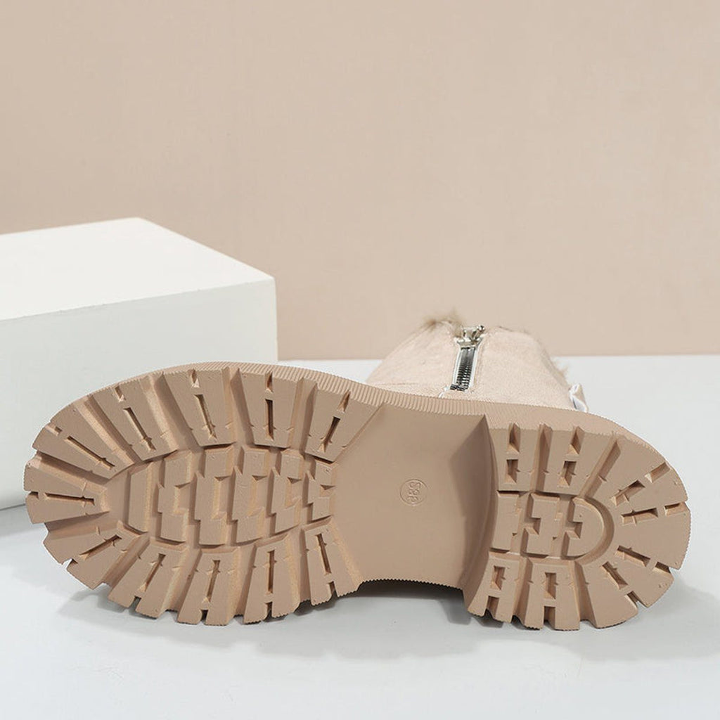 Suede platform ankle boots, slip-on style, product still life