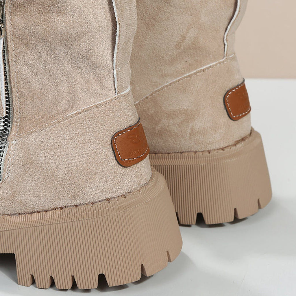 Suede platform ankle boots, slip-on style, product still life