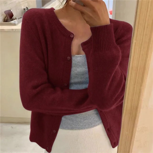 Grey V-neck knit cardigan with a loose fit for transitional layering
