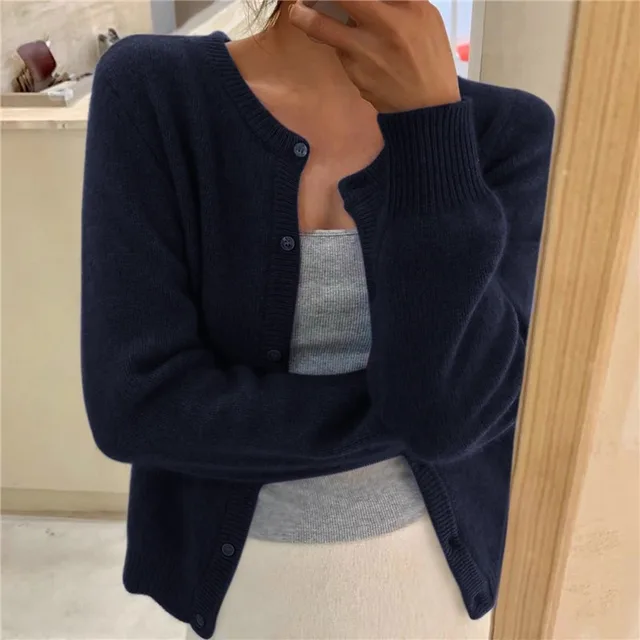Black open front knit cardigan with a loose, everyday fit for layering