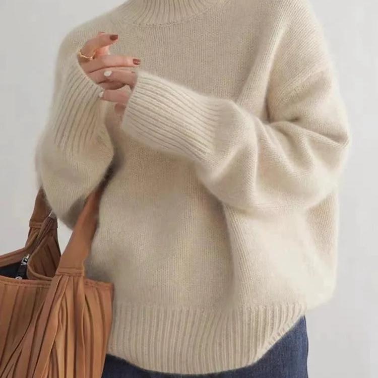 Beige oversized cashmere roll neck jumper with an oversized, cosy drape