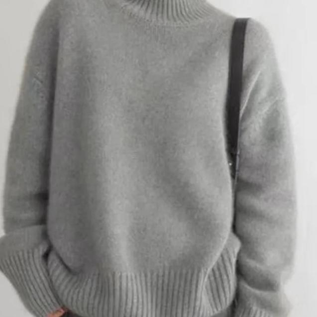 Khaki oversized cashmere roll neck jumper with an oversized, cosy drape