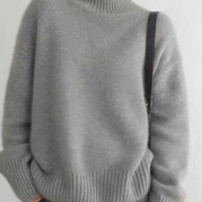 Khaki oversized cashmere roll neck jumper with an oversized, cosy drape