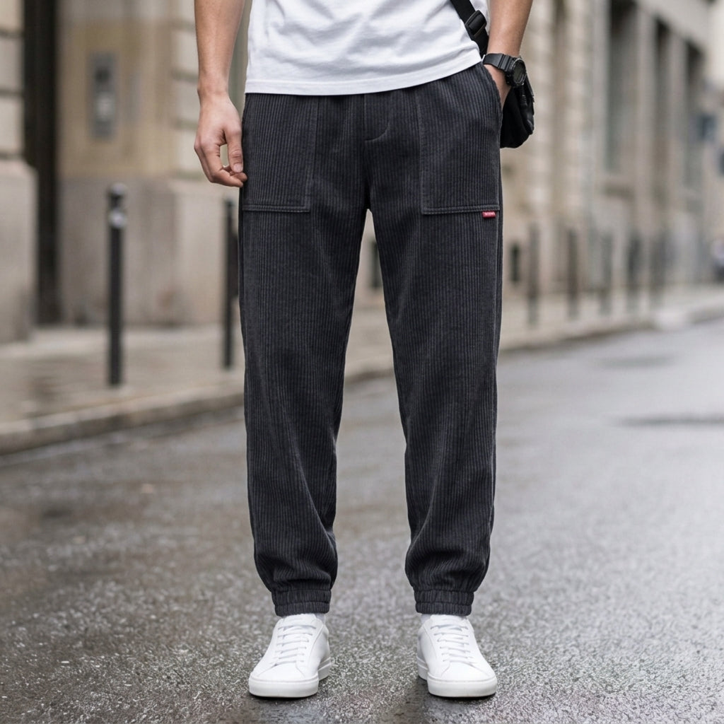 Men's mustard yellow corduroy joggers with a tapered fit and cuffed hem