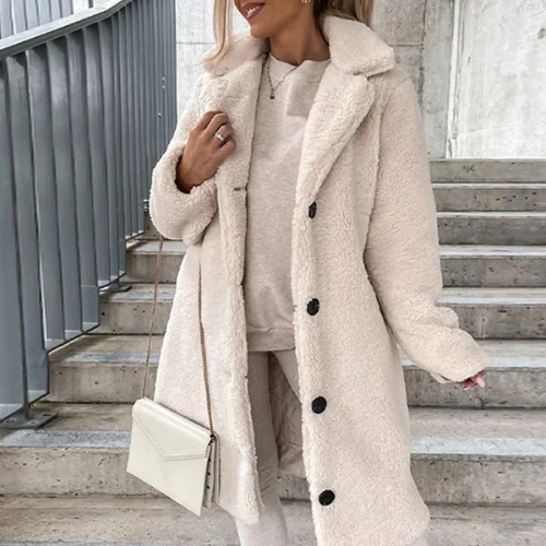 Teddy coat with notched collar and button front, product still life