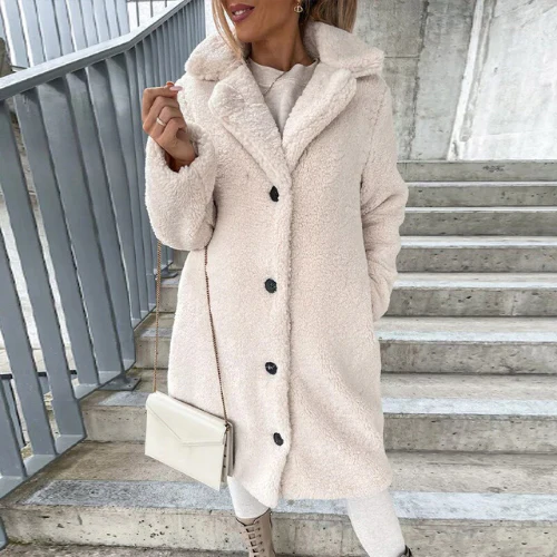Teddy coat with notched collar and button front, product still life