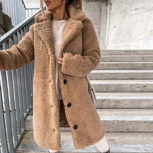 Teddy coat with notched collar and button front, product still life