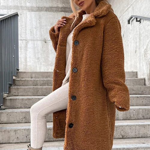 Teddy coat with notched collar and button front, product still life