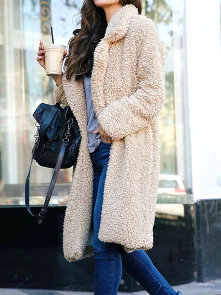 Women's apricot longline borg teddy coat with a plush, insulated finish