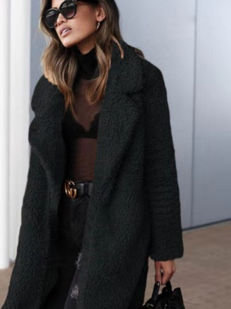 Women's apricot longline borg teddy coat with a plush, insulated finish