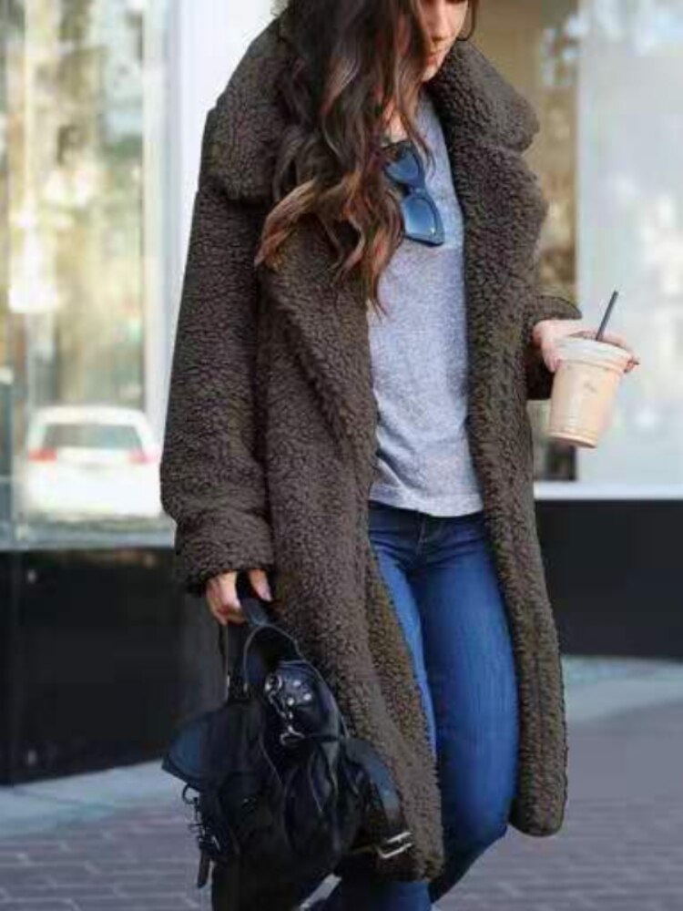 Women's apricot longline borg teddy coat with a plush, insulated finish