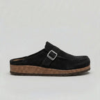Suede-look clogs with adjustable buckle strap, product still life