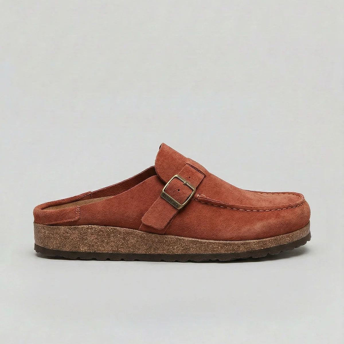 Suede-look clogs with adjustable buckle strap, product still life