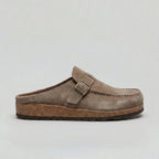 Suede-look clogs with adjustable buckle strap, product still life