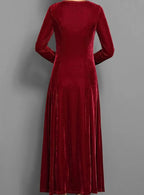 Women's velvet long sleeve maxi dress with an A line skirt, back view