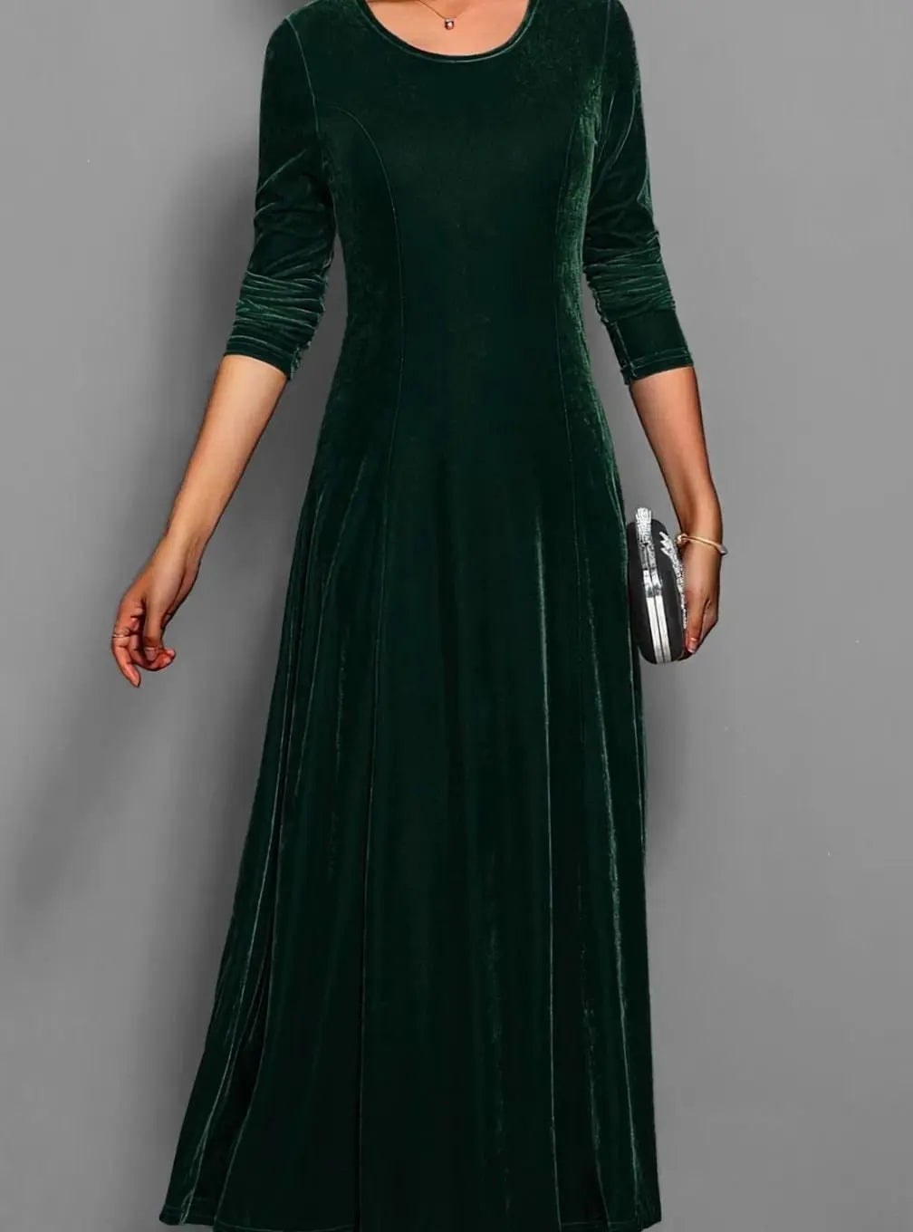 Women's dark green velvet long sleeve maxi dress with an A line skirt