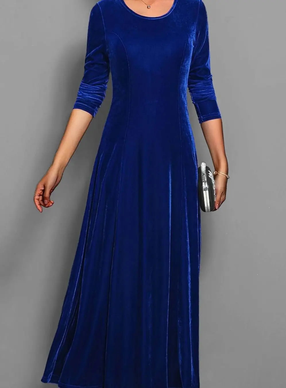Women's blue velvet long sleeve maxi dress with an A line skirt