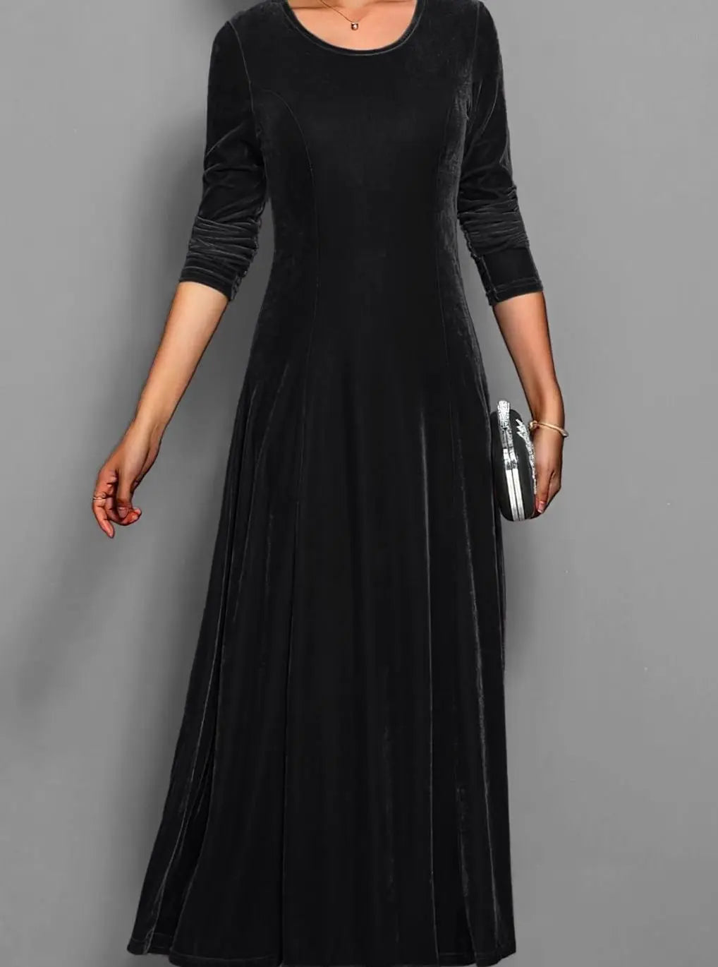 Women's black velvet long sleeve maxi dress with an A line skirt