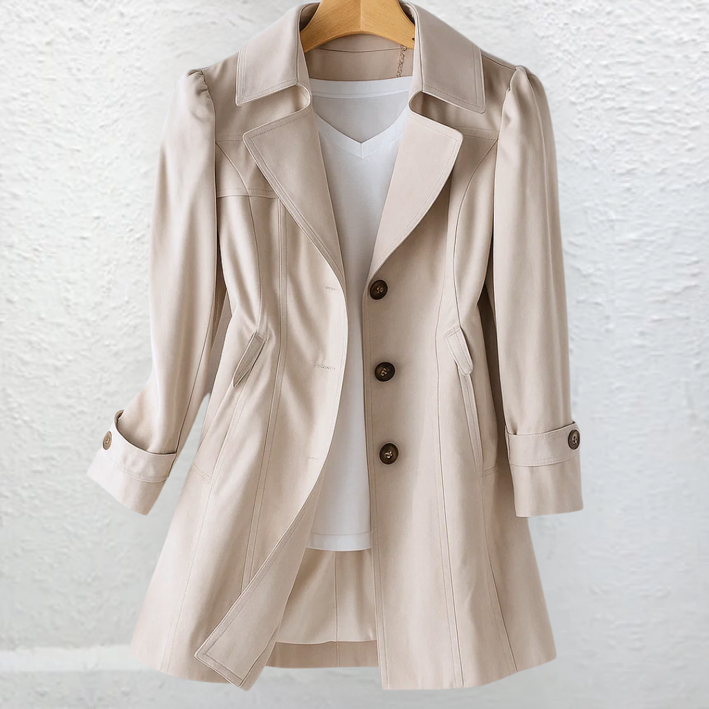 Vintage-style coat with trench collar and button front, product still life