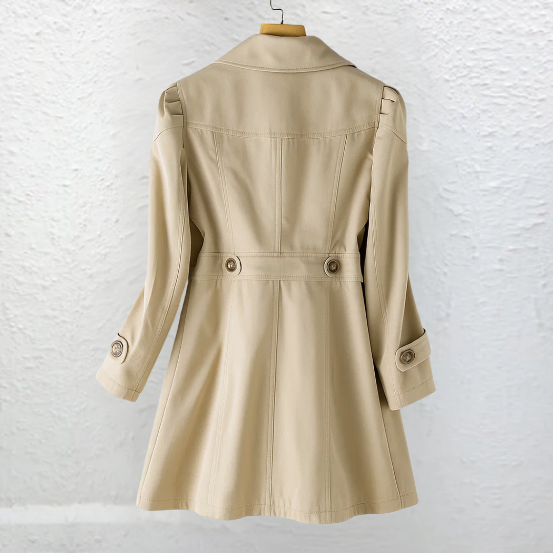 Vintage-style coat with trench collar and button front, product still life