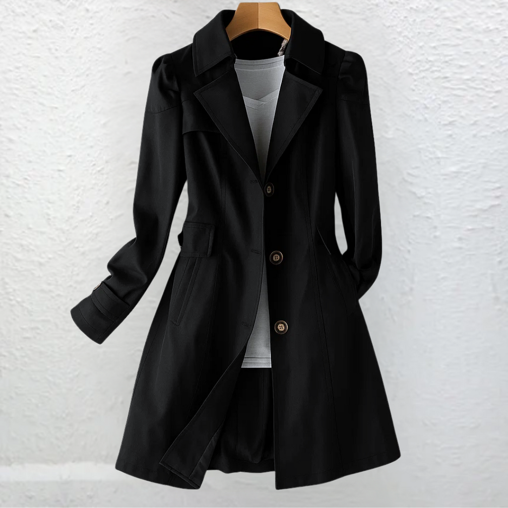 Vintage-style coat with trench collar and button front, product still life