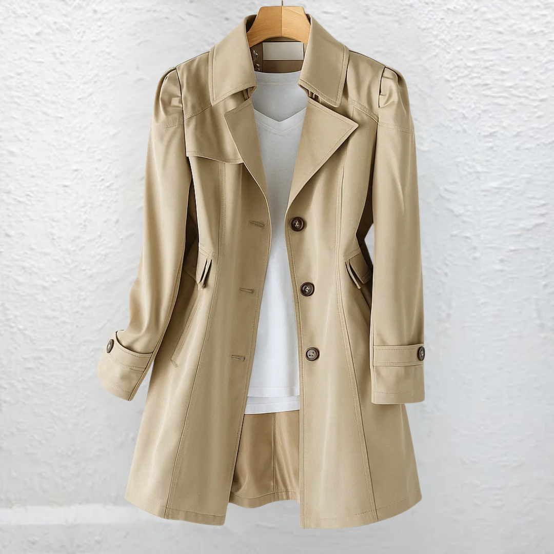 Vintage-style coat with trench collar and button front, product still life