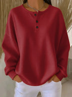 Women's dark red oversized waffle knit henley sweatshirt