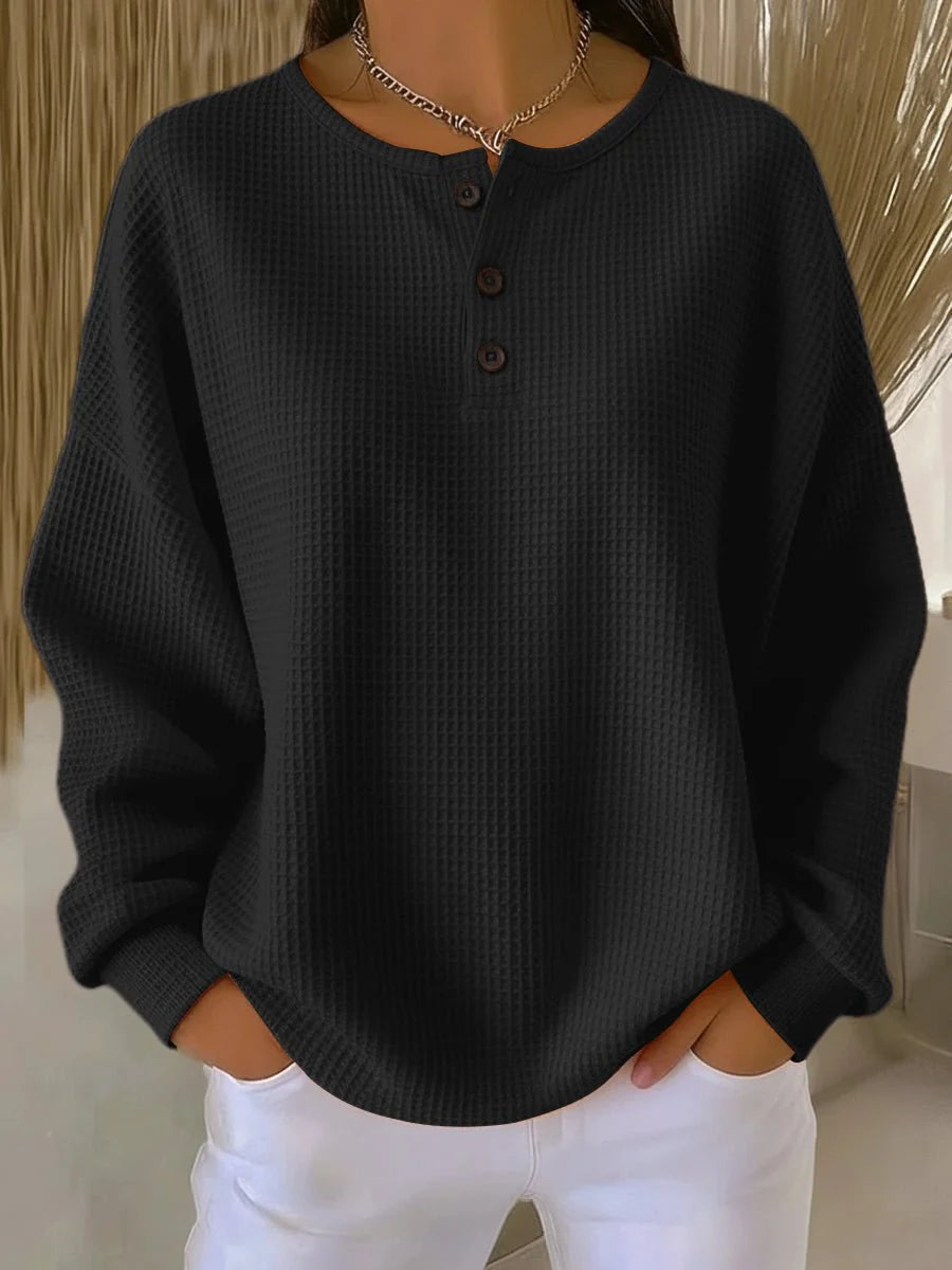 Women's black oversized waffle knit henley sweatshirt