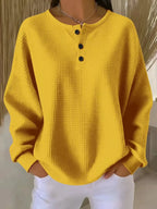 Women's mustard oversized waffle knit henley sweatshirt
