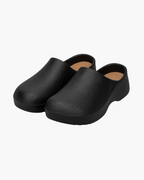 Slip-on comfort clogs, product still life