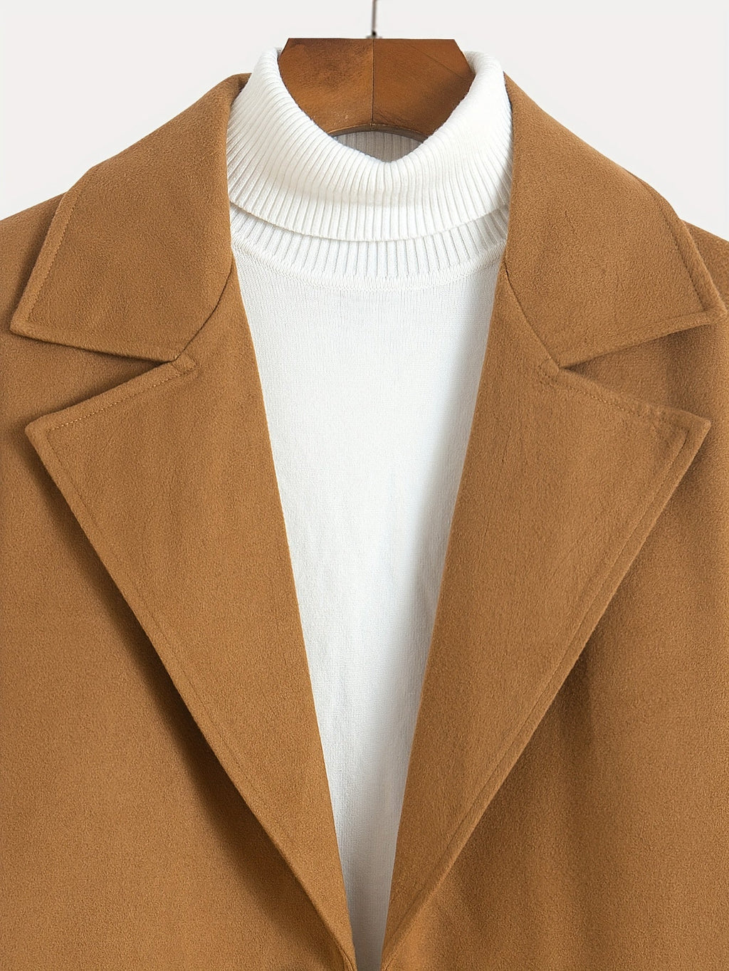 Tailored longline coat, product still life