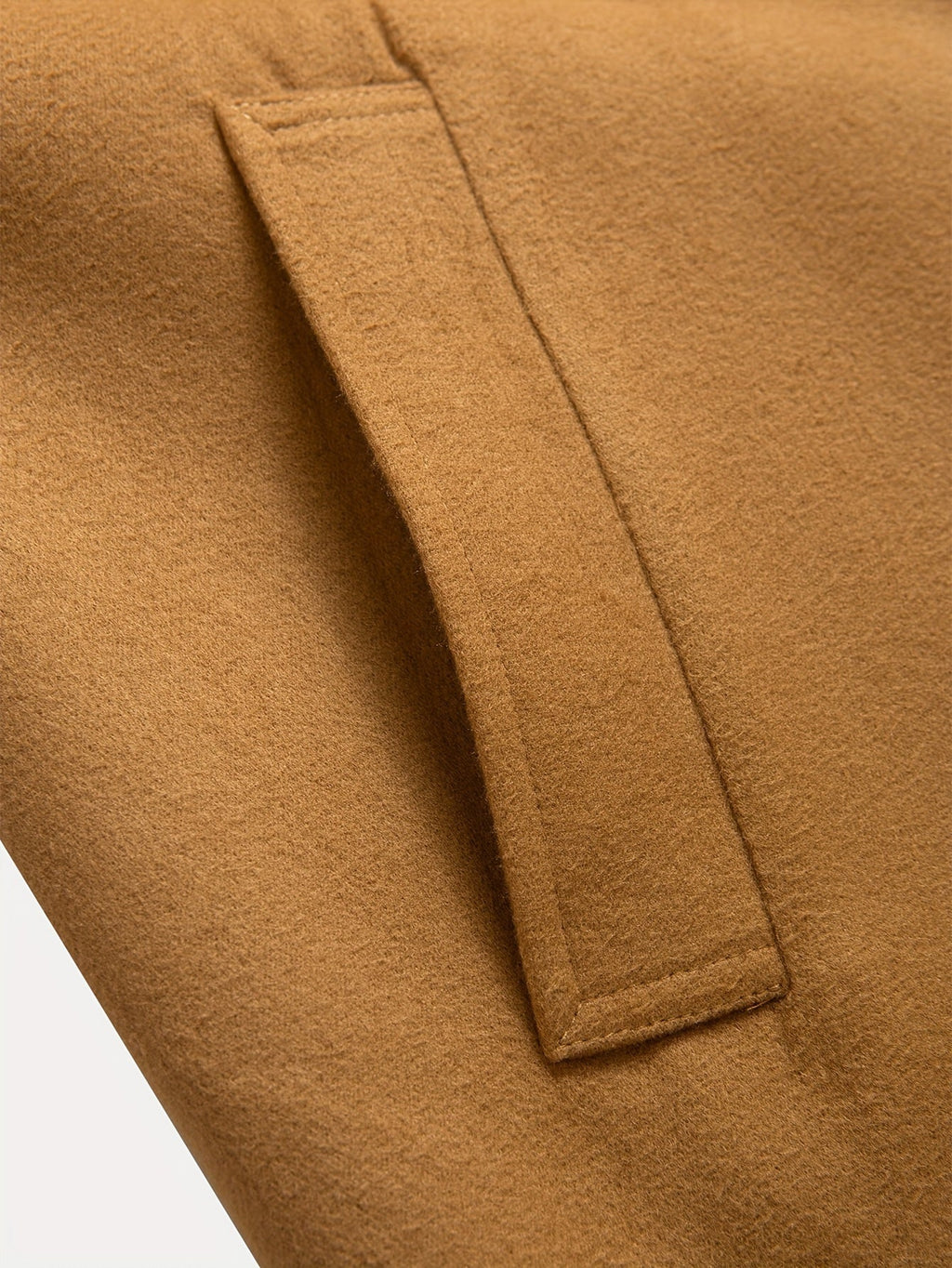 Tailored longline coat, product still life