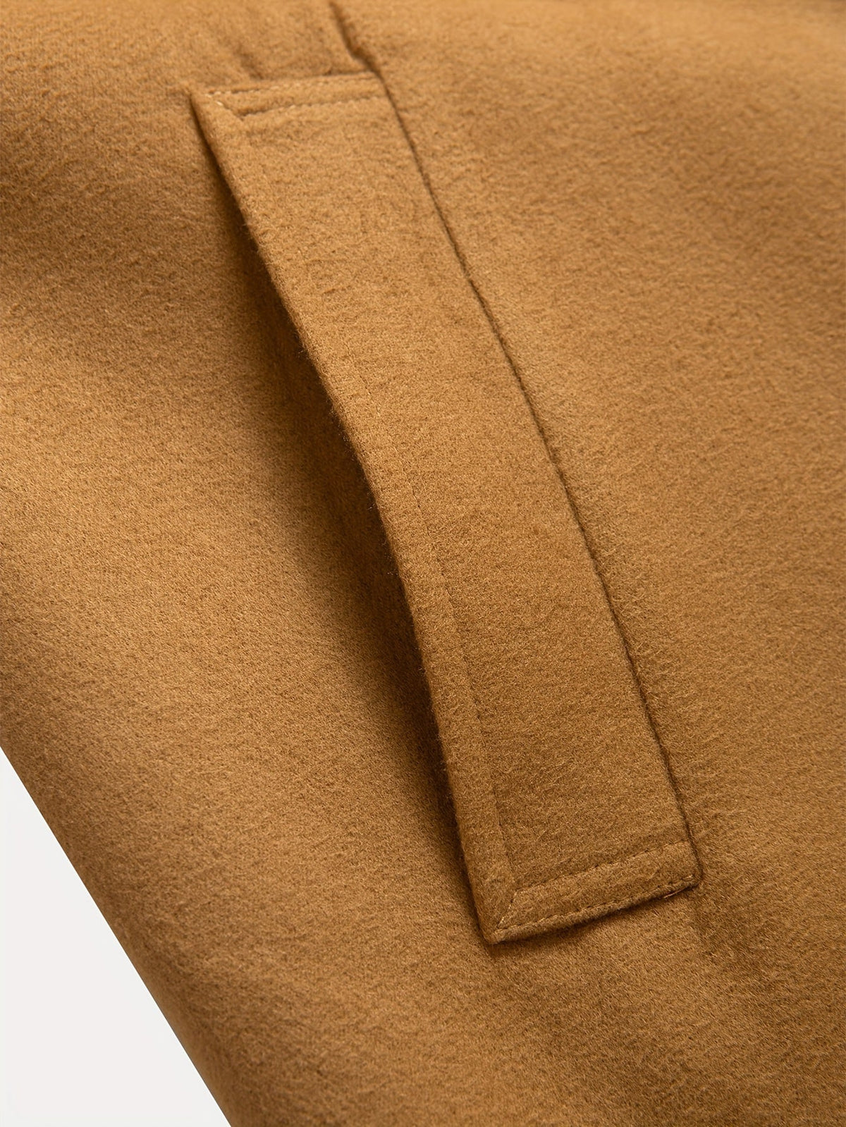 Tailored longline coat, product still life