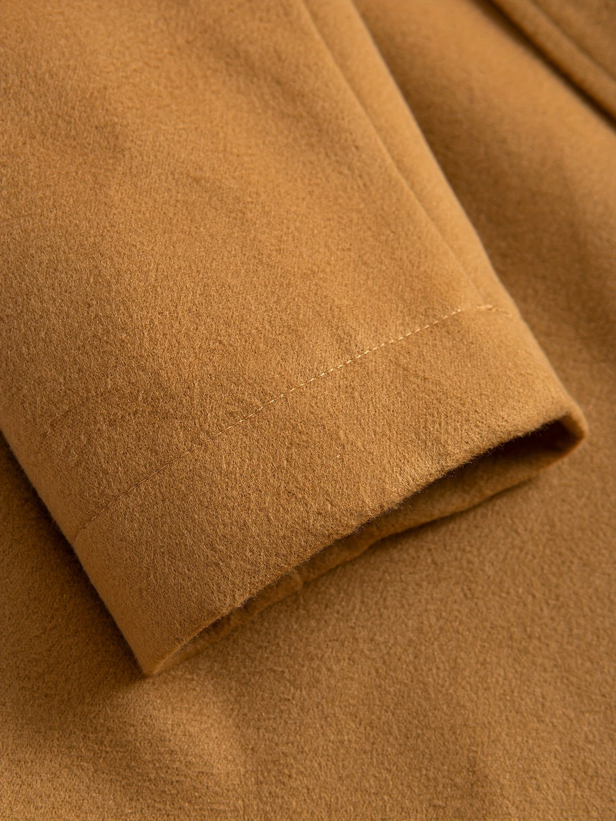 Tailored longline coat, product still life