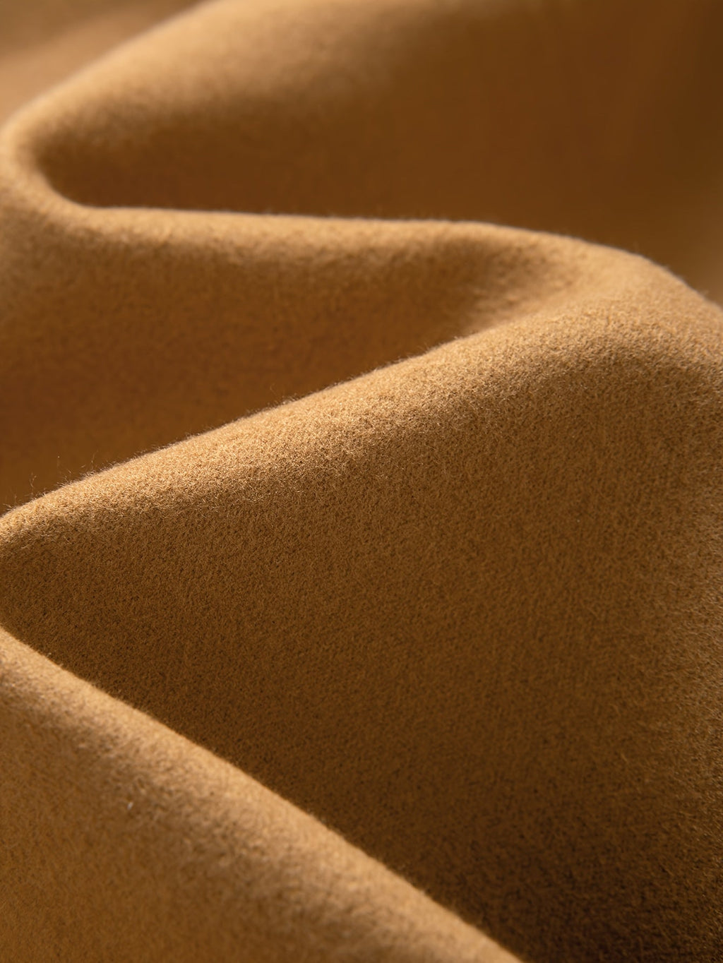 Tailored longline coat, product still life