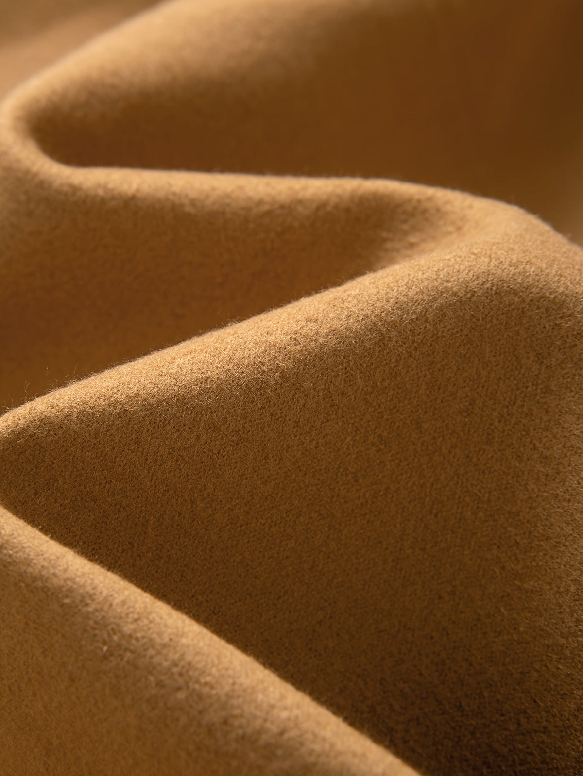 Tailored longline coat, product still life